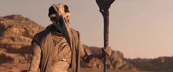 Movie still from “Moon Knight” (2022), directed by Mohamed Diab – An image of an evil looking creature holding a spear; Close Up shot, Low angle