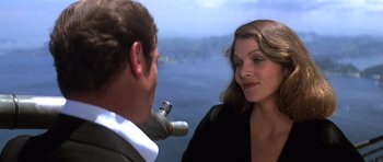 Movie still from “Moonraker” (1979), directed by Lewis Gilbert – A man and a woman looking at each other; Close Up shot, Over the shoulder angle
