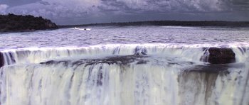 Movie still from “Moonraker” (1979), directed by Lewis Gilbert – A body of water that has a body of water in the background; Extreme Wide shot, High angle