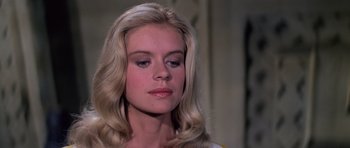 Movie still from “Moonraker” (1979), directed by Lewis Gilbert – A woman with long blonde hair looking to her left; Close Up shot, Low angle