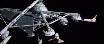 Movie still from “Moonraker” (1979), directed by Lewis Gilbert – An image of a space station in the space; Extreme Wide shot, Overhead angle