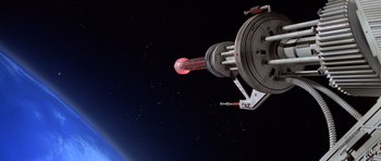 Movie still from “Moonraker” (1979), directed by Lewis Gilbert – A view of a space station from the space shuttle; Extreme Wide shot, Low angle