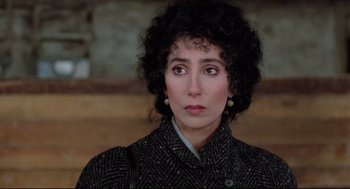 Movie still from “Moonstruck” (1987), directed by Norman Jewison – A person wearing a jacket; Close Up shot, High angle