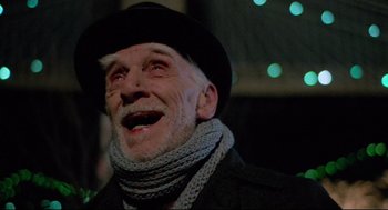 Movie still from “Moonstruck” (1987), directed by Norman Jewison – An old man wearing a hat and a scarf; Close Up shot, Low angle