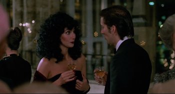 Movie still from “Moonstruck” (1987), directed by Norman Jewison – A man and a woman are talking to each other; Close Up shot, Over the shoulder angle