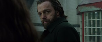 Movie still from “Mortal Engines” (2018), directed by Christian Rivers – A person with a beard; Close Up shot, Low angle