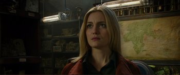 Movie still from “Mortal Engines” (2018), directed by Christian Rivers – A person with long blonde hair; Close Up shot, Over the shoulder angle
