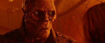 Movie still from “Mortal Engines” (2018), directed by Christian Rivers – The face of an old man with green eyes; Close Up shot, Low angle