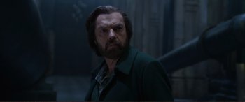 Movie still from “Mortal Engines” (2018), directed by Christian Rivers – A person wearing a jacket; Close Up shot, Low angle