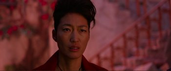 Movie still from “Mortal Engines” (2018), directed by Christian Rivers – A person wearing a red jacket; Close Up shot, Over the shoulder angle