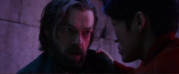 Movie still from “Mortal Engines” (2018), directed by Christian Rivers – A man and a woman looking into each other's eyes; Close Up shot, Over the shoulder angle