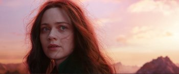 Movie still from “Mortal Engines” (2018), directed by Christian Rivers – A person with long red hair; Close Up shot, Low angle