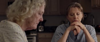 Movie still from “Mother and Child” (2009), directed by Rodrigo García – Two women in a kitchen talking to each other; Close Up shot, Over the shoulder angle