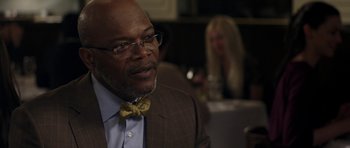 Movie still from “Mother and Child” (2009), directed by Rodrigo García – An older man wearing a suit and bow tie; Close Up shot, Over the shoulder angle