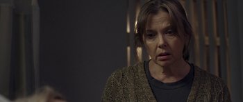 Movie still from “Mother and Child” (2009), directed by Rodrigo García – A person wearing a sweater; Close Up shot, Low angle