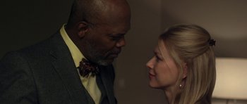 Movie still from “Mother and Child” (2009), directed by Rodrigo García – A man and a woman face to face in front of a wall; Close Up shot, Over the shoulder angle