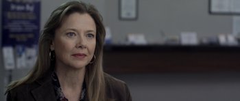 Movie still from “Mother and Child” (2009), directed by Rodrigo García – A person wearing a jacket; Close Up shot, Over the shoulder angle