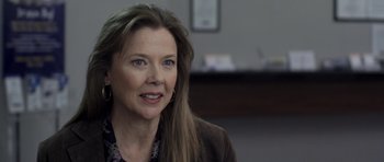 Movie still from “Mother and Child” (2009), directed by Rodrigo García – A person with long hair; Close Up shot, Over the shoulder angle