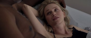 Movie still from “Mother and Child” (2009), directed by Rodrigo García – A woman laying on a bed with her hands behind her head; Close Up shot, Overhead angle