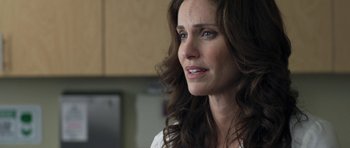 Movie still from “Mother and Child” (2009), directed by Rodrigo García – A person with long brown hair; Close Up shot, Over the shoulder angle