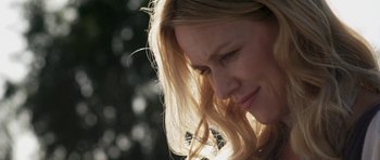 Movie still from “Mother and Child” (2009), directed by Rodrigo García – A woman with long blonde hair looking down; Close Up shot, Over the shoulder angle