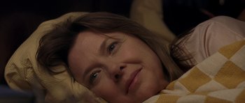 Movie still from “Mother and Child” (2009), directed by Rodrigo García – A person laying on a bed; Close Up shot, Over the shoulder angle