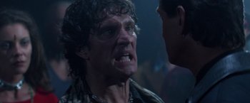 Movie still from “Mr. Nice Guy” (1997), directed by Sammo Kam-Bo Hung – An older man is looking angry at a younger man; Close Up shot, Over the shoulder angle