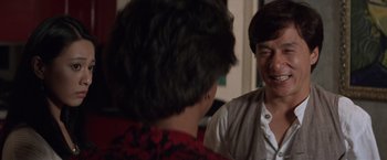 Movie still from “Mr. Nice Guy” (1997), directed by Sammo Kam-Bo Hung – Two people talking to each other in a room; Close Up shot, Over the shoulder angle