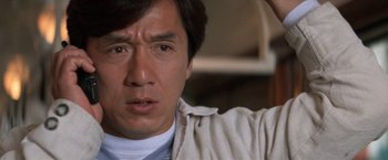 Movie still from “Mr. Nice Guy” (1997), directed by Sammo Kam-Bo Hung – A person wearing a shirt; Close Up shot, Low angle