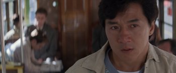 Movie still from “Mr. Nice Guy” (1997), directed by Sammo Kam-Bo Hung – A person wearing a jacket; Close Up shot, Over the shoulder angle