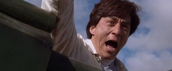 Movie still from “Mr. Nice Guy” (1997), directed by Sammo Kam-Bo Hung – A person with his mouth wide open; Close Up shot, Low angle