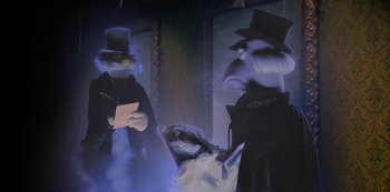 Movie still from “Muppets Haunted Mansion” (2021), directed by Kirk R. Thatcher – A couple of people that are in a room; Medium shot, Low angle
