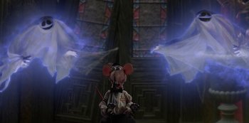 Movie still from “Muppets Haunted Mansion” (2021), directed by Kirk R. Thatcher – A mouse with a sword in his mouth; Medium shot, Overhead angle