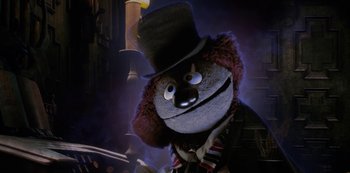 Movie still from “Muppets Haunted Mansion” (2021), directed by Kirk R. Thatcher – A teddy bear wearing a top hat and a tie; Close Up shot, Low angle
