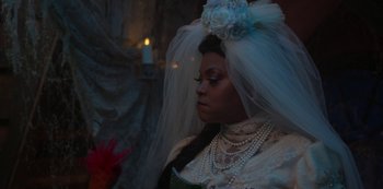 Movie still from “Muppets Haunted Mansion” (2021), directed by Kirk R. Thatcher – A woman in a wedding dress with a veil; Close Up shot, Over the shoulder angle