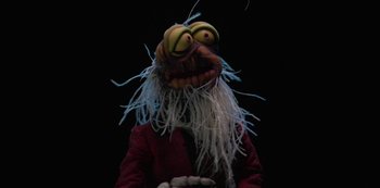 Movie still from “Muppets Haunted Mansion” (2021), directed by Kirk R. Thatcher – A person wearing a mask; Close Up shot, Low angle