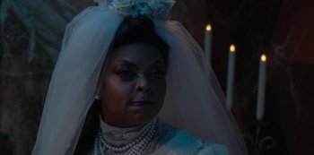 Movie still from “Muppets Haunted Mansion” (2021), directed by Kirk R. Thatcher – A woman in a wedding dress with a veil; Close Up shot, High angle