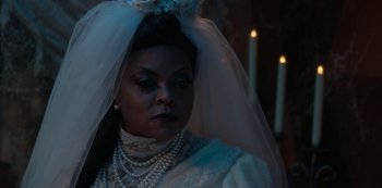 Movie still from “Muppets Haunted Mansion” (2021), directed by Kirk R. Thatcher – A woman wearing a wedding dress and a veil; Close Up shot, Over the shoulder angle