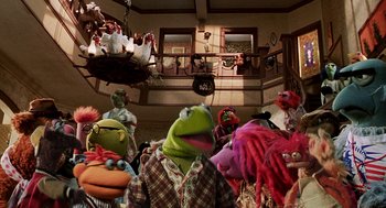 Movie still from “Muppets from Space” (1999), directed by Tim Hill – A group of people dressed up as the muppets; Wide shot, High angle