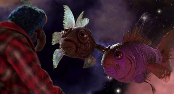 Movie still from “Muppets from Space” (1999), directed by Tim Hill – A couple of stuffed animals that are in the air; Close Up shot, Low angle