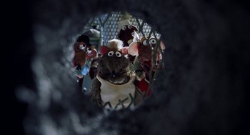 Movie still from “Muppets from Space” (1999), directed by Tim Hill – A group of stuffed animals in a pile of fur; Extreme Close Up shot, Low angle
