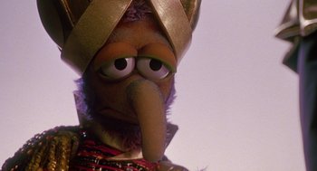 Movie still from “Muppets from Space” (1999), directed by Tim Hill – The head of a muppet character; Close Up shot, Over the shoulder angle