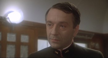 Movie still from “Murder on the Orient Express” (1974), directed by Sidney Lumet – A person wearing a military uniform; Close Up shot, Low angle