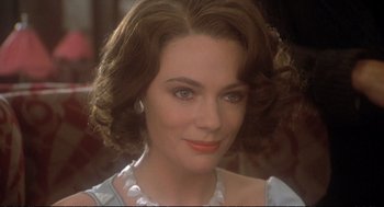 Movie still from “Murder on the Orient Express” (1974), directed by Sidney Lumet – A person with short hair; Close Up shot, Over the shoulder angle