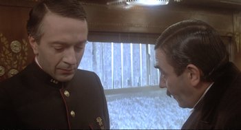 Movie still from “Murder on the Orient Express” (1974), directed by Sidney Lumet – Two men in military uniforms talking to each other; Close Up shot, Over the shoulder angle