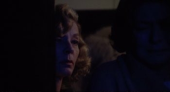 Movie still from “Murder on the Orient Express” (1974), directed by Sidney Lumet – A woman with blonde hair is looking out a window; Close Up shot, Over the shoulder angle