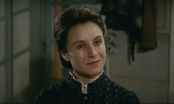 Movie still from “Muriel” (1963), directed by Alain Resnais – A person wearing a dress; Close Up shot, High angle