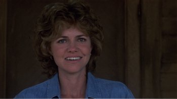 Movie still from “Murphy's Romance” (1985), directed by Martin Ritt – A person wearing a blue shirt; Close Up shot, Over the shoulder angle