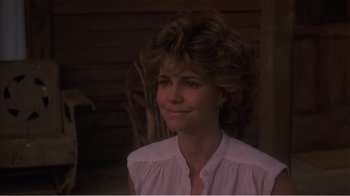 Movie still from “Murphy's Romance” (1985), directed by Martin Ritt – A person wearing a white shirt; Close Up shot, Over the shoulder angle