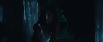 Movie still from “Mustang” (2015), directed by Deniz Gamze Ergüven – A young girl sitting in front of a window at night; Close Up shot, Over the shoulder angle